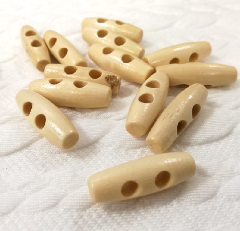 Drevený gombík 10x30 mm oliva- kus